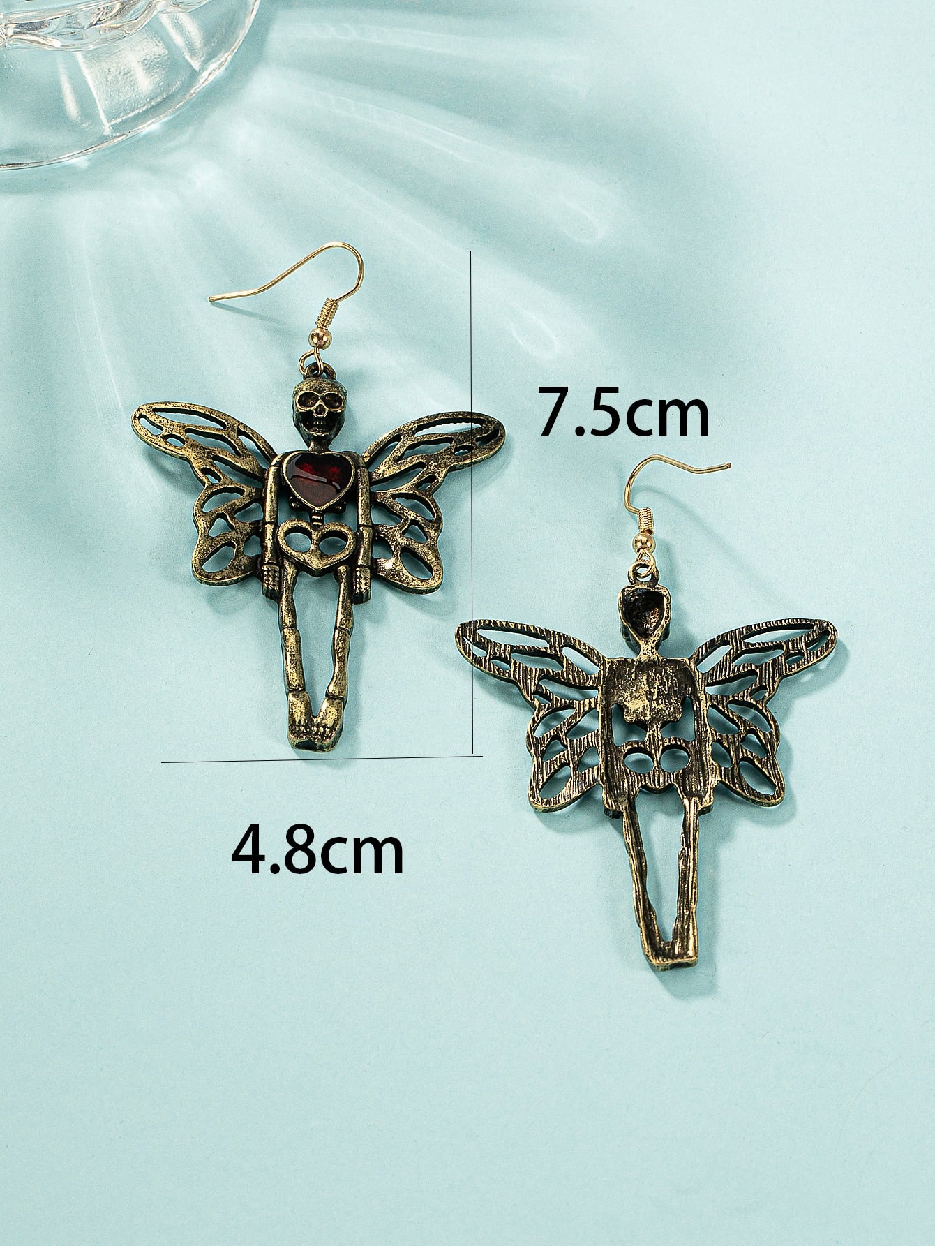 Pendientes colgantes con forma de corazón y mariposa esqueleto