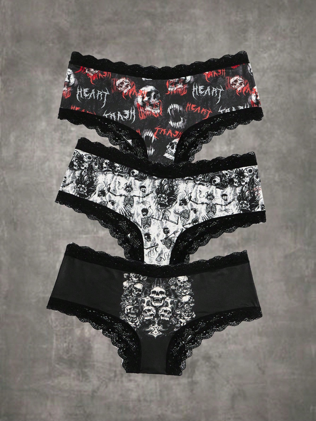Conjunto de 3 braguitas de encaje en contraste con estampado de calavera gótico