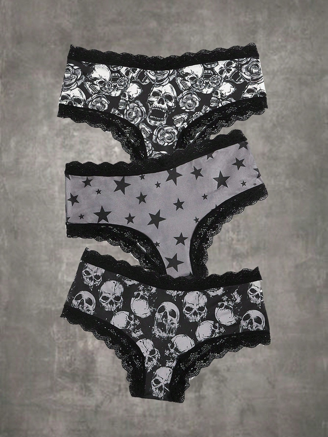 Conjunto de 3 braguitas de encaje en contraste con estampado de calavera gótico