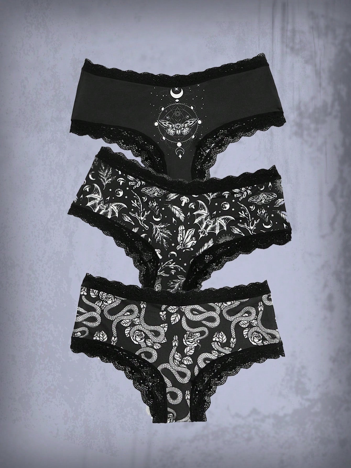 Conjunto de 3 braguitas de encaje en contraste con estampado de calavera gótico